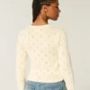 Cardigan cu ochiuri Cardigan cu ochiuri