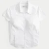 Cămașă cu mâneci scurte din poplin elastic, cu nasturi Cămașă cu mâneci scurte din poplin elastic, cu nasturi