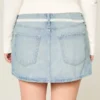 Fustă mini din denim cu talie joasă și dantelă