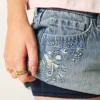 Fustă-pantalon micro din denim cu talie ultra joasă Fustă-pantalon micro din denim cu talie ultra joasă