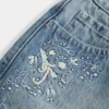 Fustă-pantalon micro din denim cu talie ultra joasă Fustă-pantalon micro din denim cu talie ultra joasă
