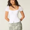 Fustă-pantalon mini din denim camuflat, cu talie joasă și croială curbață Fustă-pantalon mini din denim camuflat, cu talie joasă și croială curbață