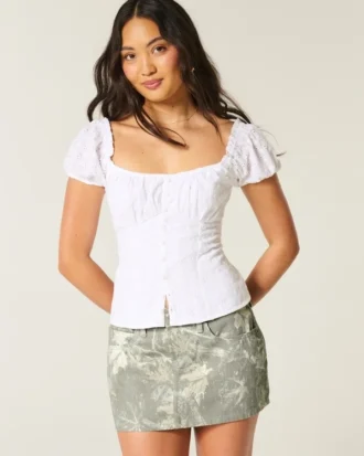 Fustă-pantalon mini din denim camuflat, cu talie joasă și croială curbață