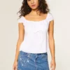 Fustă-pantalon mini din denim cu broderie în lanț, spălare medie Fustă-pantalon mini din denim cu broderie în lanț, spălare medie