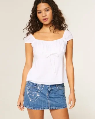 Fustă-pantalon mini din denim cu broderie în lanț, spălare medie