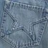 Fustă-pantalon mini din denim cu buzunar brodat cu stele Fustă-pantalon mini din denim cu buzunar brodat cu stele