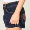 Fustă-pantalon mini din denim cu buzunare, în carouri, de culoare închisă, cu talie joasă Fustă-pantalon mini din denim cu buzunare, în carouri, de culoare închisă, cu talie joasă
