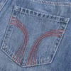 Fustă-pantalon mini din denim cu cusături roșii și talie joasă Fustă-pantalon mini din denim cu cusături roșii și talie joasă
