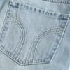 Fustă-pantalon mini din denim cu talie joasă Fustă-pantalon mini din denim cu talie joasă
