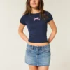 Fustă-pantalon mini din denim cu talie joasă și fundă brodată Fustă-pantalon mini din denim cu talie joasă și fundă brodată