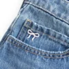 Fustă-pantalon mini din denim cu talie joasă și fundă brodată Fustă-pantalon mini din denim cu talie joasă și fundă brodată