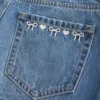 Fustă-pantalon mini din denim cu talie joasă și fundă brodată Fustă-pantalon mini din denim cu talie joasă și fundă brodată