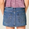 Fustă-pantalon mini din denim cu talie joasă și ținte Fustă-pantalon mini din denim cu talie joasă și ținte