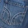 Fustă-pantalon mini din denim cu talie joasă și ținte Fustă-pantalon mini din denim cu talie joasă și ținte