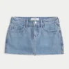 Fustă-pantalon mini din denim cu talie joasă și spălare medie Fustă-pantalon mini din denim cu talie joasă și spălare medie