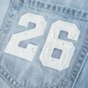 Fustă-pantalon mini din denim cu talie joasă, modelul „Class of ’26” Fustă-pantalon mini din denim cu talie joasă, modelul „Class of ’26”
