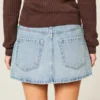 Fustă-pantalon mini din denim cu talie joasă, spălare medie și ținte Fustă-pantalon mini din denim cu talie joasă, spălare medie și ținte