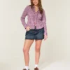 Fustă-pantalon mini din denim închis la culoare, cu talie joasă Fustă-pantalon mini din denim închis la culoare, cu talie joasă