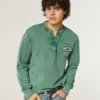 Grafică cu logo-ul Holiday Vault Release Henley