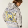 Hanorac cu glugă Boxy University of Michigan Wolverines Graphic Camo Hanorac cu glugă Boxy University of Michigan Wolverines Graphic Camo