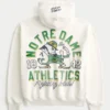Hanorac cu glugă și fermoar, cu imprimeu Fighting Irish al Universității Notre Dame Hanorac cu glugă și fermoar, cu imprimeu Fighting Irish al Universității Notre Dame