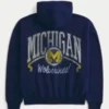 Hanorac cu glugă și fermoar, model boxy, cu imprimeu grafic Wolverines, Universitatea din Michigan Hanorac cu glugă și fermoar, model boxy, cu imprimeu grafic Wolverines, Universitatea din Michigan