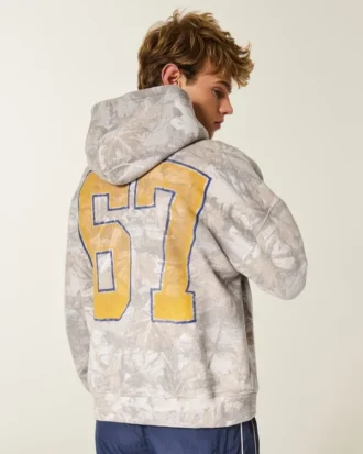 Hanorac cu glugă și imprimeu camuflaj Boxy West Virginia University Mountaineers Hanorac cu glugă și imprimeu camuflaj Boxy West Virginia University Mountaineers