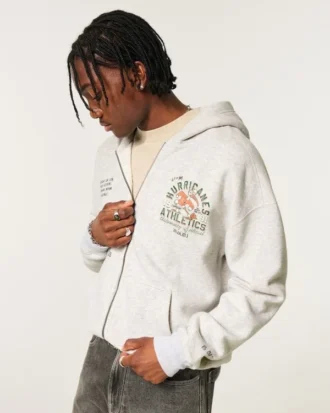 Hanorac cu glugă și imprimeu grafic Boxy Zip-Up University of Miami Hurricanes Hanorac cu glugă și imprimeu grafic Boxy Zip-Up University of Miami Hurricanes