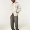 Hanorac cu glugă și imprimeu grafic Boxy Zip-Up University of Miami Hurricanes Hanorac cu glugă și imprimeu grafic Boxy Zip-Up University of Miami Hurricanes