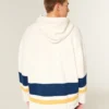 Hanorac cu glugă și imprimeu grafic Fighting Irish al Universității Notre Dame Hanorac cu glugă și imprimeu grafic Fighting Irish al Universității Notre Dame