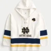 Hanorac cu glugă și imprimeu grafic Fighting Irish al Universității Notre Dame Hanorac cu glugă și imprimeu grafic Fighting Irish al Universității Notre Dame