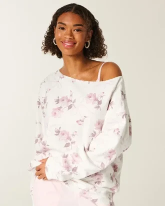 Hanorac oversized cu umeri decupați și model floral cu fundă