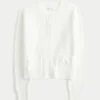 Hollister Cardigan confortabil cu buzunare în formă de fundiță Hollister Cardigan confortabil cu buzunare în formă de fundiță