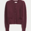 Hollister Cardigan confortabil cu buzunare în formă de fundiță Hollister Cardigan confortabil cu buzunare în formă de fundiță