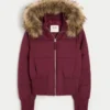 Jacheta bomber cu garnitură din blană artificială Jacheta bomber cu garnitură din blană artificială