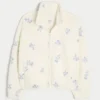 Jacheta brodată din fleece Sherpa Jacheta brodată din fleece Sherpa