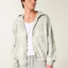 Jacheta windbreaker cu fermoar și imprimeu camuflaj