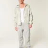 Jacheta windbreaker cu fermoar și imprimeu camuflaj