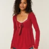 Lansare Holiday Vault Top babydoll din tricot cu satin și legătură în față Lansare Holiday Vault Top babydoll din tricot cu satin și legătură în față