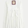Lansare Holiday Vault Top babydoll din tricot cu satin și legătură în față Lansare Holiday Vault Top babydoll din tricot cu satin și legătură în față