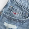 Mini pantaloni scurți din denim brodați, cu talie ultra joasă Mini pantaloni scurți din denim brodați, cu talie ultra joasă