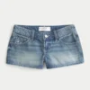 Mini pantaloni scurți din denim cu talie ultra joasă, spălare medie și broderie florală Mini pantaloni scurți din denim cu talie ultra joasă, spălare medie și broderie florală