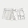 Mini pantaloni scurți din fleece cu imprimeu numeric Mini pantaloni scurți din fleece cu imprimeu numeric