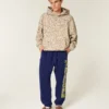 Pantaloni de jogging largi din fleece cu imprimeu Wolverines de la Universitatea din Michigan Pantaloni de jogging largi din fleece cu imprimeu Wolverines de la Universitatea din Michigan