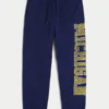 Pantaloni de jogging largi din fleece cu imprimeu Wolverines de la Universitatea din Michigan Pantaloni de jogging largi din fleece cu imprimeu Wolverines de la Universitatea din Michigan