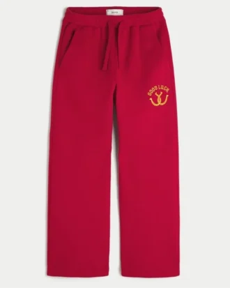 Pantaloni de trening bootcut cu imprimeu Good Luck