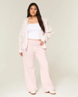 Pantaloni de trening cu buzunar în formă de inimă și croi larg