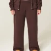 Pantaloni de trening cu buzunar în formă de inimă și croi larg Pantaloni de trening cu buzunar în formă de inimă și croi larg