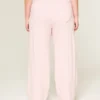 Pantaloni de trening cu buzunar în formă de inimă și croi larg Pantaloni de trening cu buzunar în formă de inimă și croi larg