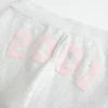 Pantaloni de trening cu croi bootcut și imprimeu grafic 2001